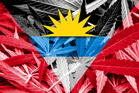 Antigua and Barbuda Flag on cannabis background