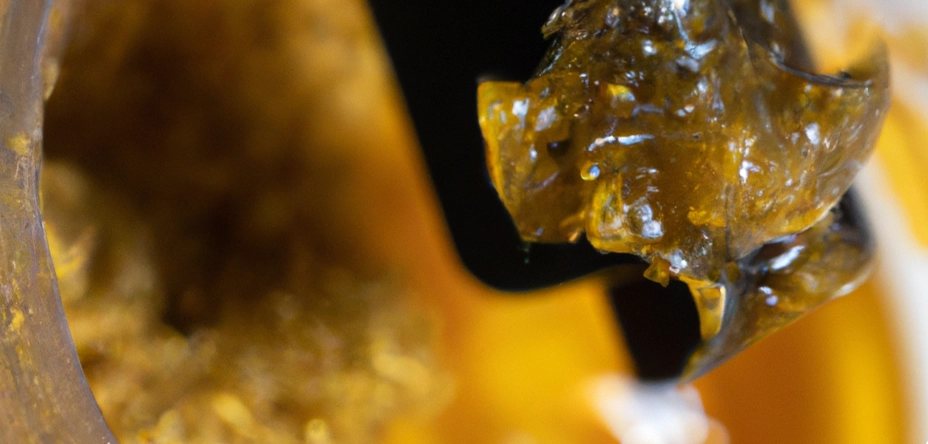 A closeup photo of cannabis concentrate in a dab rig