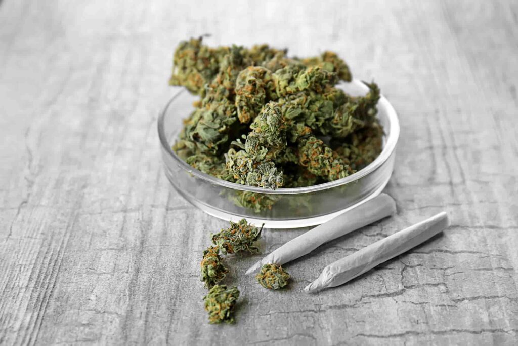 a bowl of marijuana and a cigarette | Denver dispensary