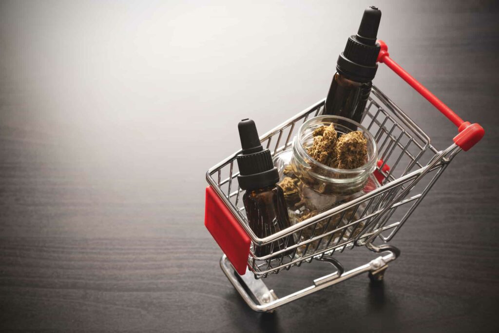 a shopping cart with bottles of marijuana in it for Cannabis Delivery